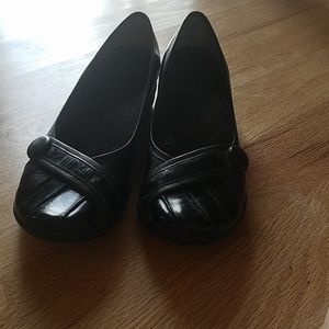 Black button flats
